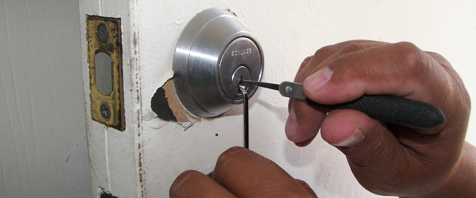 How does locksmith open a locked door?